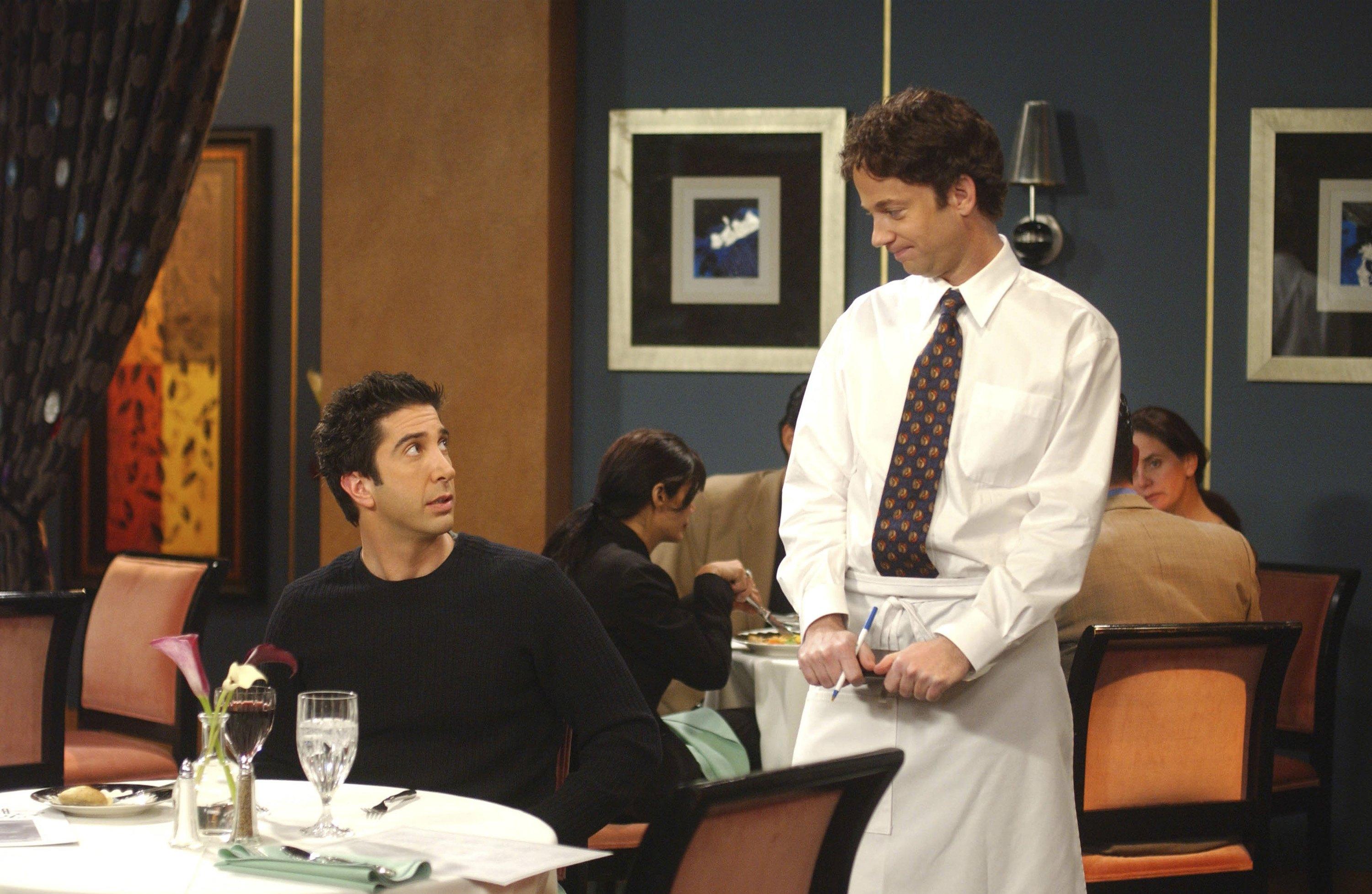 David Schwimmer as Ross Geller, Sam Pancake as The Waiter in an episode of